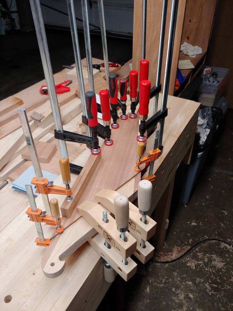 Figure 7. Gluing on the soundboard.