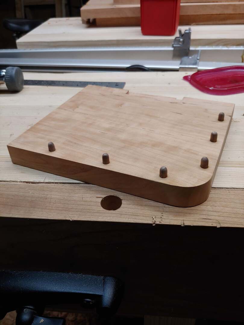 Figure 5. Walnut pegs on the shelf.